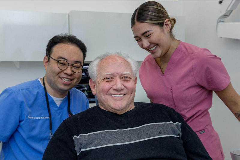 patient smiling confidently after their dental procedure